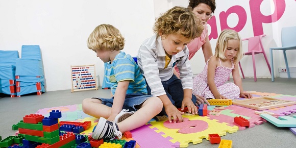 Teacher playing with students